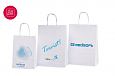 Valged paberist kotid on s.. | Fotogalerii- valged paberkotid, millele trkitud klientide logod sa