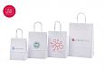 Valged paberist kotid on s.. | Fotogalerii- valged paberkotid, millele trkitud klientide logod n